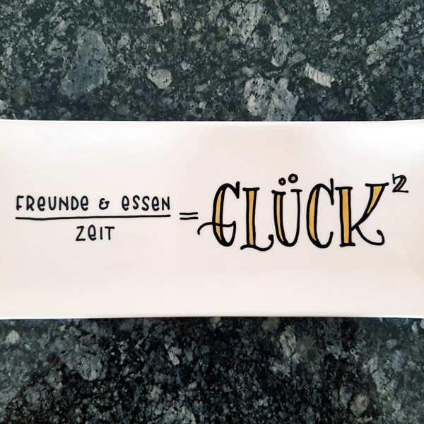 Meine persönliche Glücksformel auf einer Schale