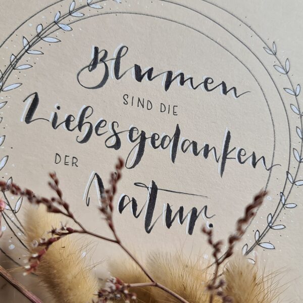 Handlettering-Spruch, passend dekoriert