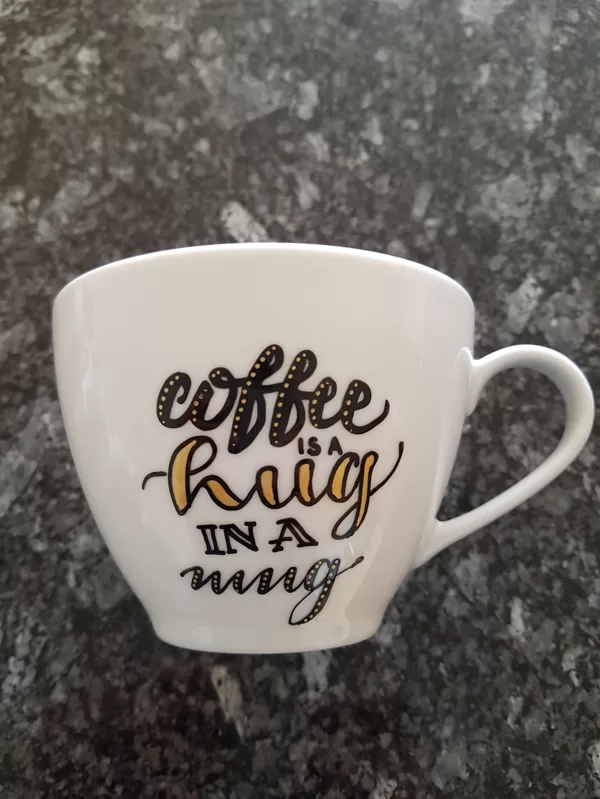 L - Coffee is a hug in a mug